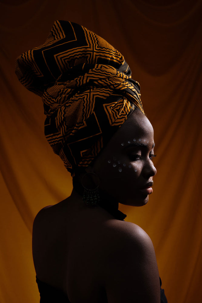 cosmétique africaine - produits de beauté africains - femme africaine coiffée